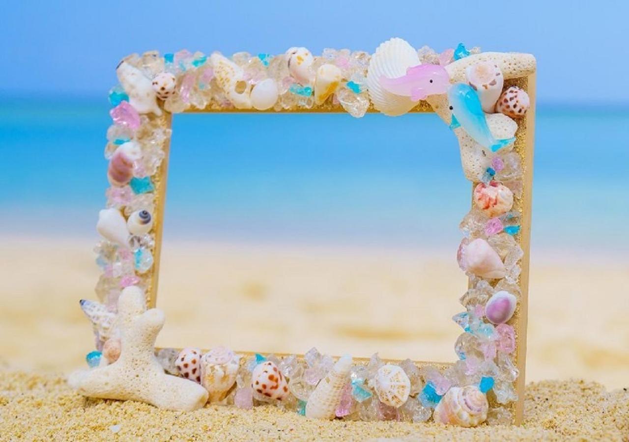אונה Hotel Monterey Okinawa Spa & Resort מראה חיצוני תמונה A seashell frame